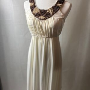 FRANCESCAS Soft ivory dress with beaded neck.